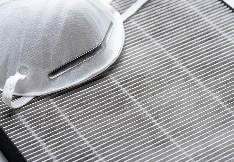 close up image of a mask on a dirty filter before being cleaned by keeply.