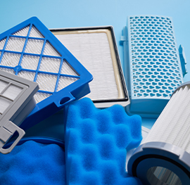 several clean filters of different types stacked together after being cleaned by keeply.